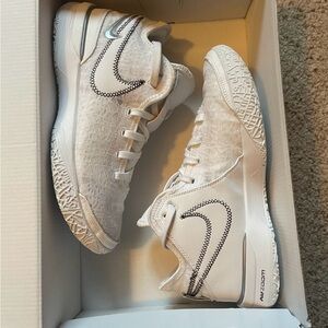 Nike White Sneakers with Black Detailing